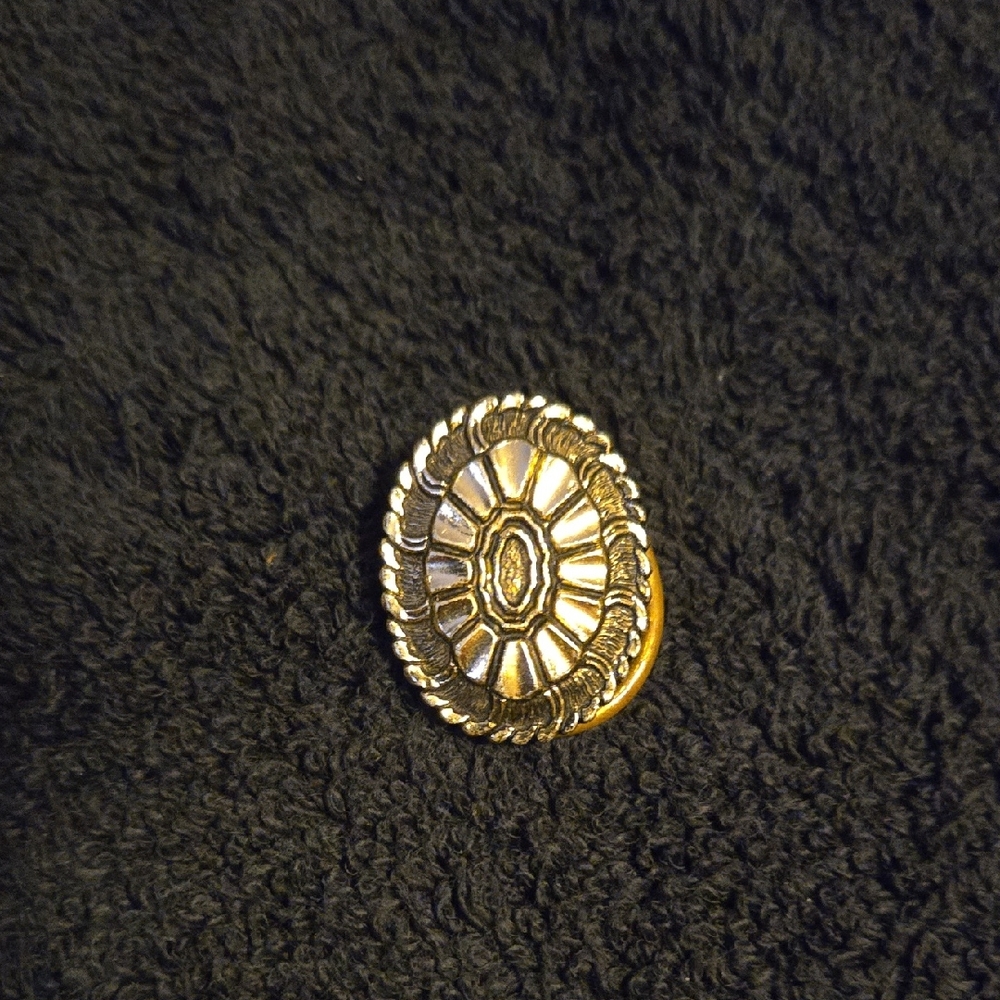 Gold and Silver Floral Brooches with Intricate Patterns